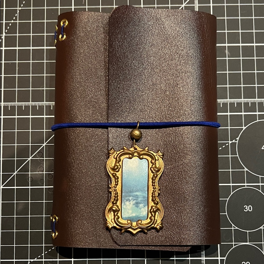 Brown Leather trifold travelling Journal with Blue Accent